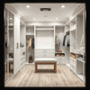Spacious walk-in closet with custom shelving, drawers, and hanging rods in a clean modern design