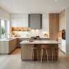 Bright modern kitchen with sleek cabinetry, island seating, and integrated appliances