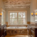 comfort room with white bathtub and brown wooden cabinets