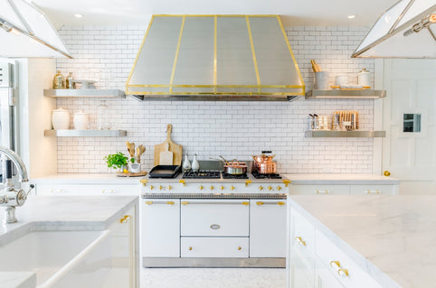 white kitchen cabinet near white stove oven