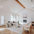 a living room with a couch a chair and a fireplace