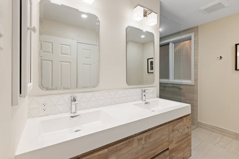 a bathroom with a large mirror