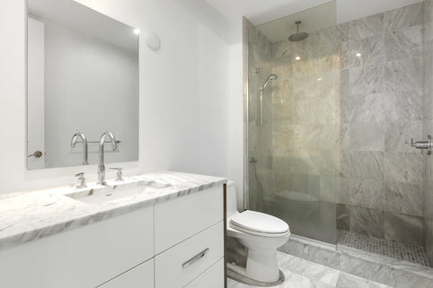 a bathroom with a glass shower