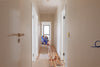 a couple of men working on a house