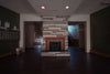 a living room with a fireplace and a fire place