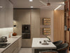 A modern kitchen with a small breakfast bar
