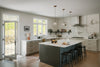 Modern kitchen with island and stainless steel appliances.