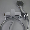 Chrome bathtub faucet with handheld showerhead