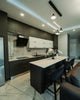 Modern kitchen with island and bar stools