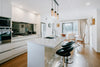 Modern kitchen with island and dining area