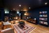 Cozy living room with fireplace and bookshelves