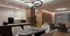 Modern dining room and kitchen with stylish furniture.