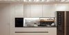 Modern white kitchen with sleek cabinets and marble backsplash.